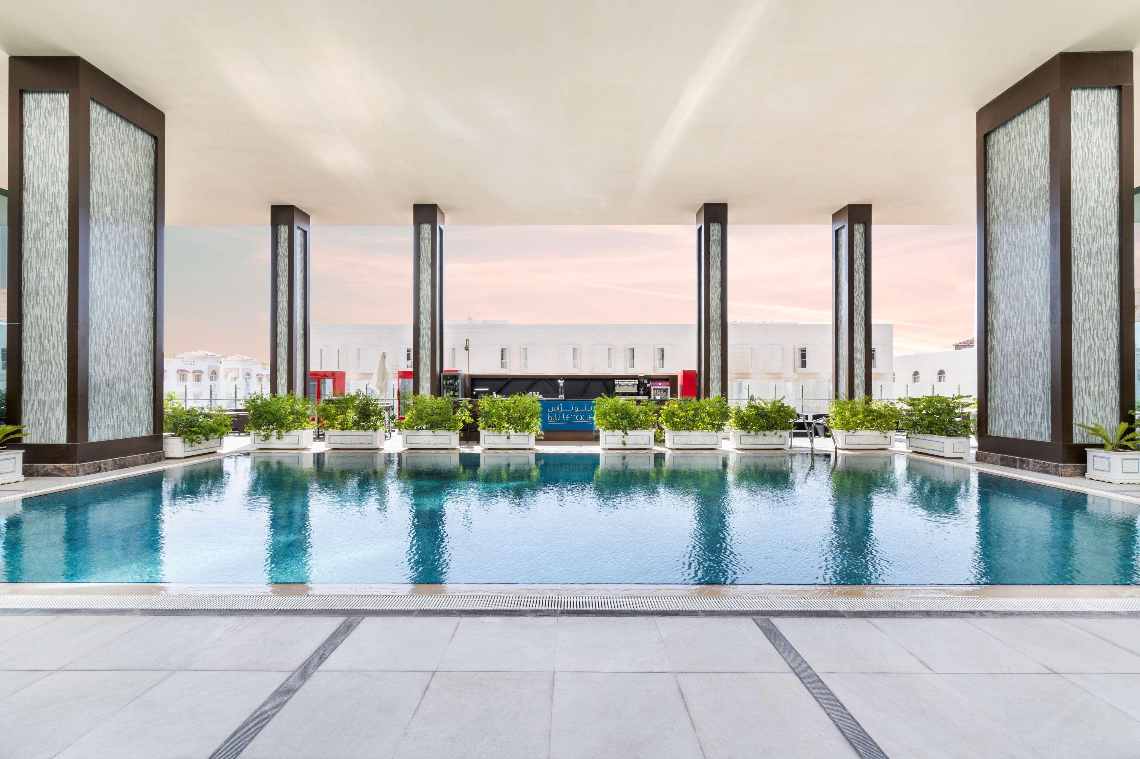 Doubletree By Hilton Doha - Al Sadd Hotel Exterior photo The pool at the W Bangkok