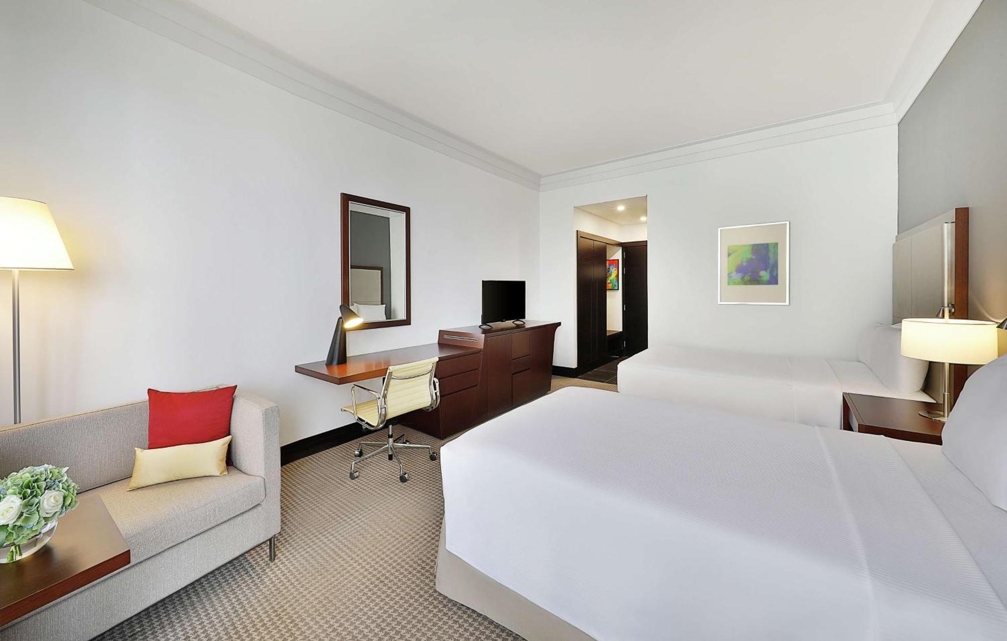 Doubletree By Hilton Doha - Al Sadd Hotel Exterior photo A room at the hotel